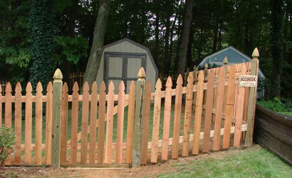 How do you install a wooden fence?